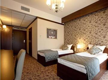Фото номера Двухместный номер с 1 кроватью или 2 отдельными кроватями Отель Hotel-Restauracja Platan г. Хшанув 4
